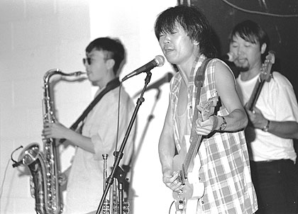 Picture of Cui Jian and bandmates